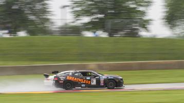  Limited number of cars brave wet surface at Road America for practice